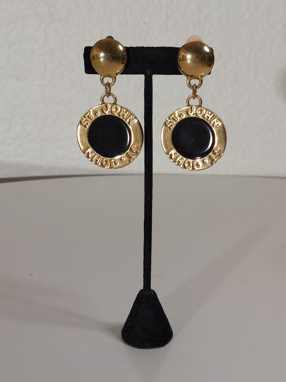 ST. JOHN Vtg Gold Toned Circular Drop Signed Logo Black Enamel Clip On Earrings